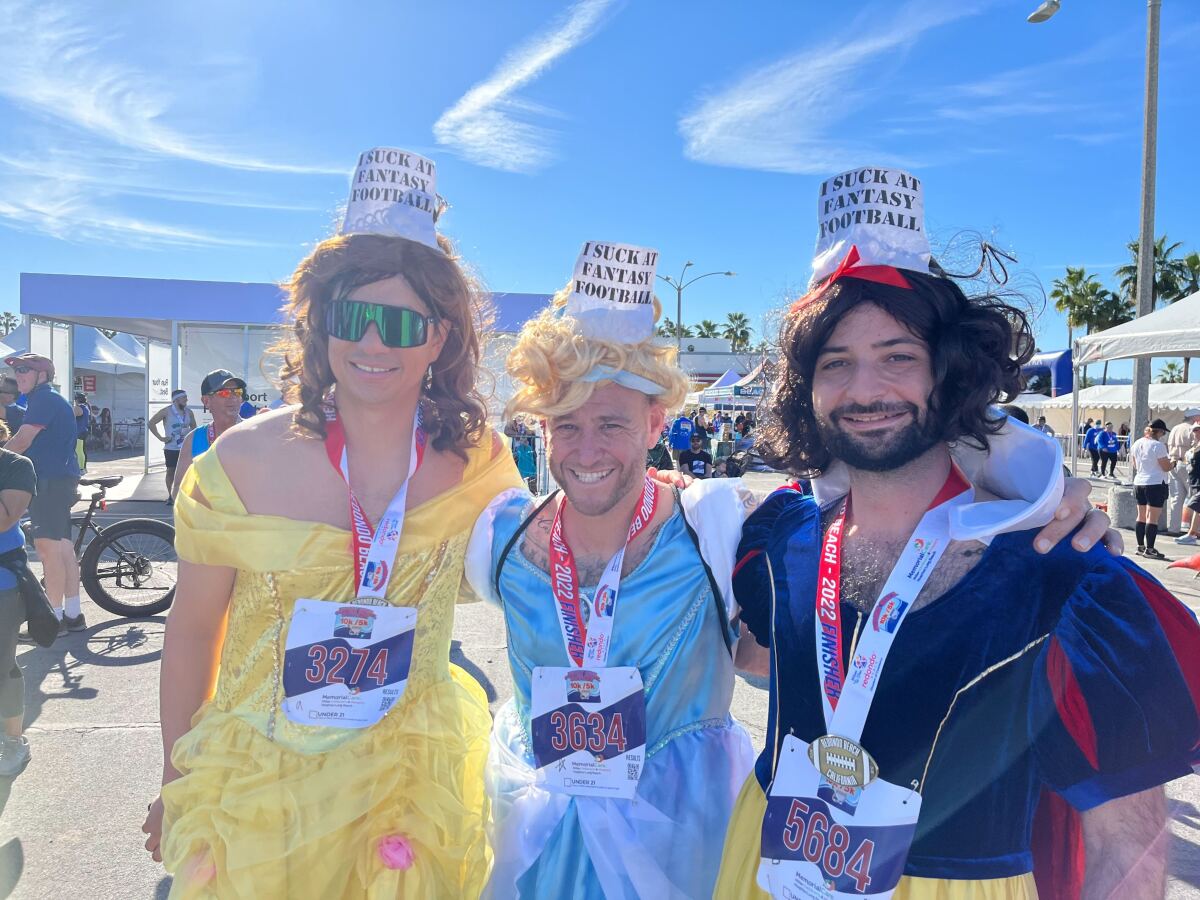A trio of men dressed as Disney princesses won the costume category for small groups.
