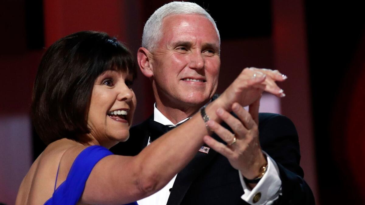 Vice President Mike Pence dances with his wife, Karen, at an inaugural ball.