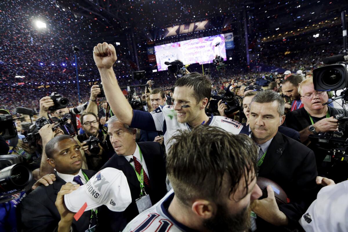 New England quarterback Tom Brady celebrates after the Patriots won Super Bowl XLIX at University of Phoenix Stadium in Glendale, Ariz., on Feb. 1.