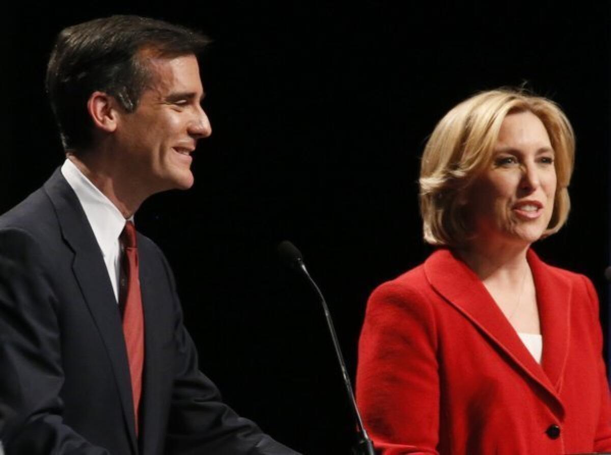Eric Garcetti, left and Wendy Greuel at a recent mayoral debate at UCLA.
