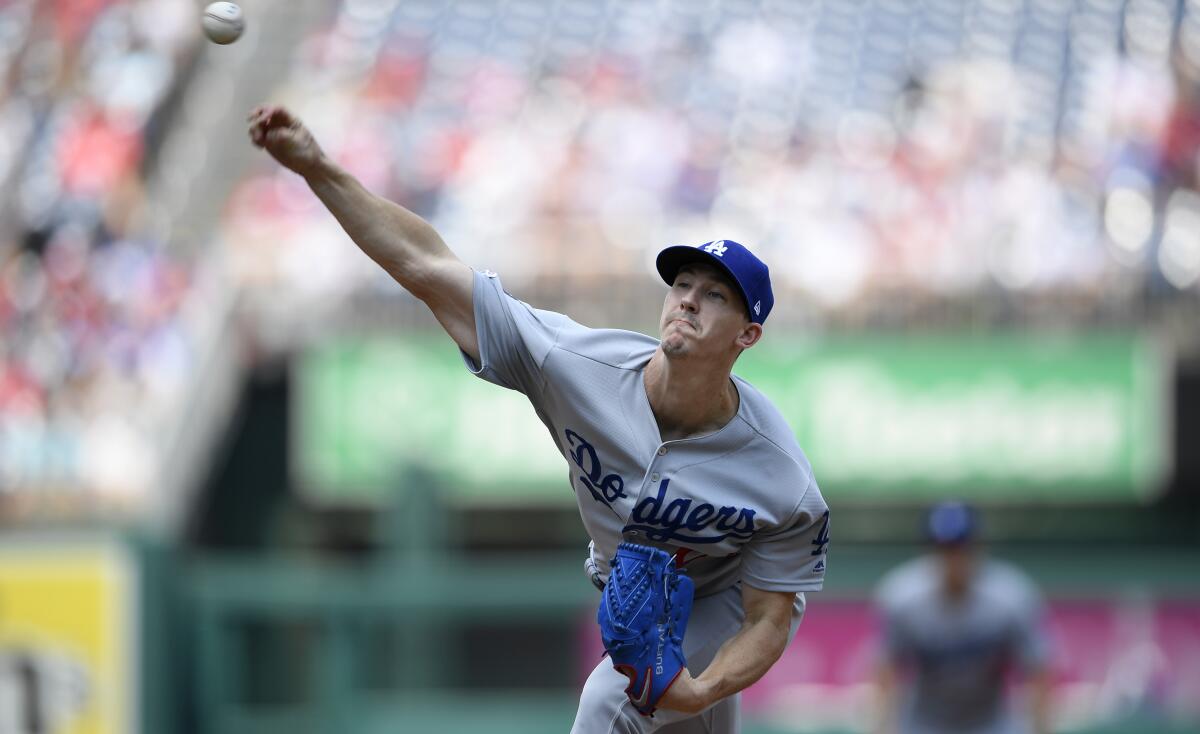 Dodgers starter Walker Buehler delivers during the first inning against the Washington Nationals on Sunday.
