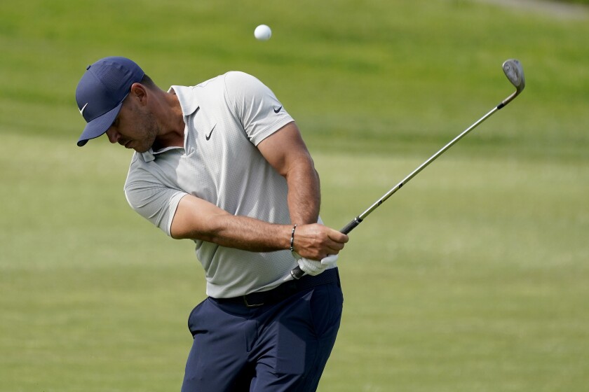 Brooks Koepka hits from the 15th fairway during a practice round of the U.S. Open Golf Championship, Wednesday, June 16, 2021, at Torrey Pines Golf Course in San Diego. (AP Photo/Marcio Jose Sanchez)