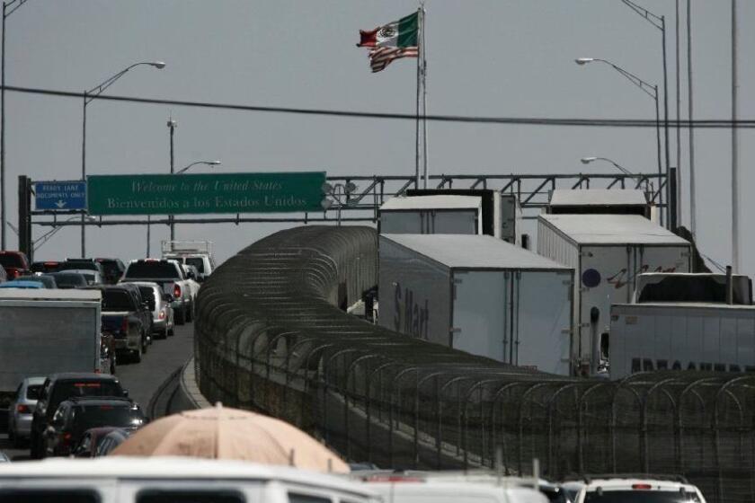 Trucks line up at the Corboba - Las Americas international bridge to cross with their cargo from Mexico into the United States, in Ciudad Juarez, Mexico, Friday, May 31, 2019. President Andrés Manuel López Obrador said Friday that Mexico won't panic over U.S. President Donald Trump's threat of coercive tariffs, measures that economists say could have dramatic consequences for both nations and potentially spur a full-blown trade war. (AP Photo/Christian Torrez)