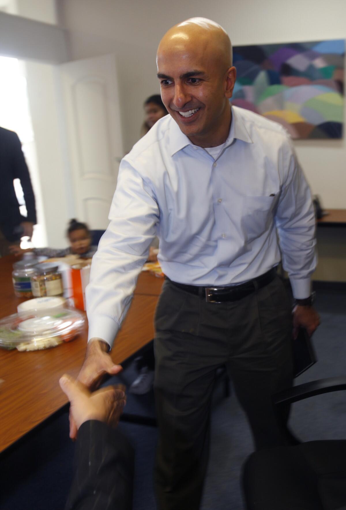 Laguna Beach millionaire Neel Kashkari has never held elected office, but he ran the taxpayer-funded federal bank bail-out under presidents George W. Bush and Obama and has worked as a fund manager, investment banker and engineer.