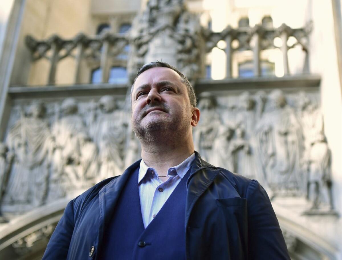 Gay rights activist Gareth Lee stands outside the British Supreme Court in London on Wednesday.