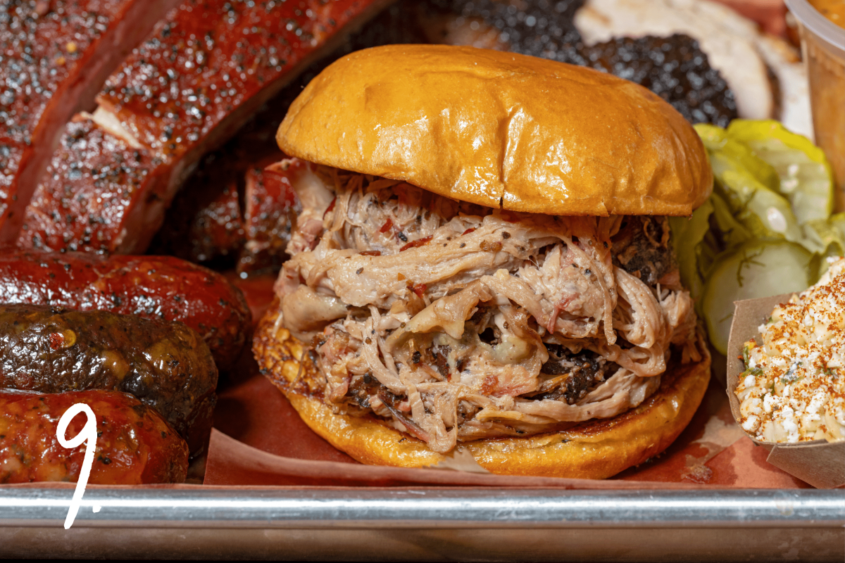 #9: a juicy Pork Sando nestled in a Meat Sweats barbecue platter 