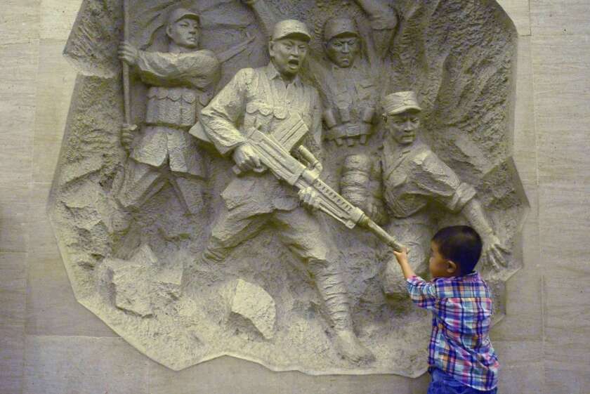 A boy visits the Chinese People's Anti-Japanese War Memorial Hall in west Beijing on Monday.
