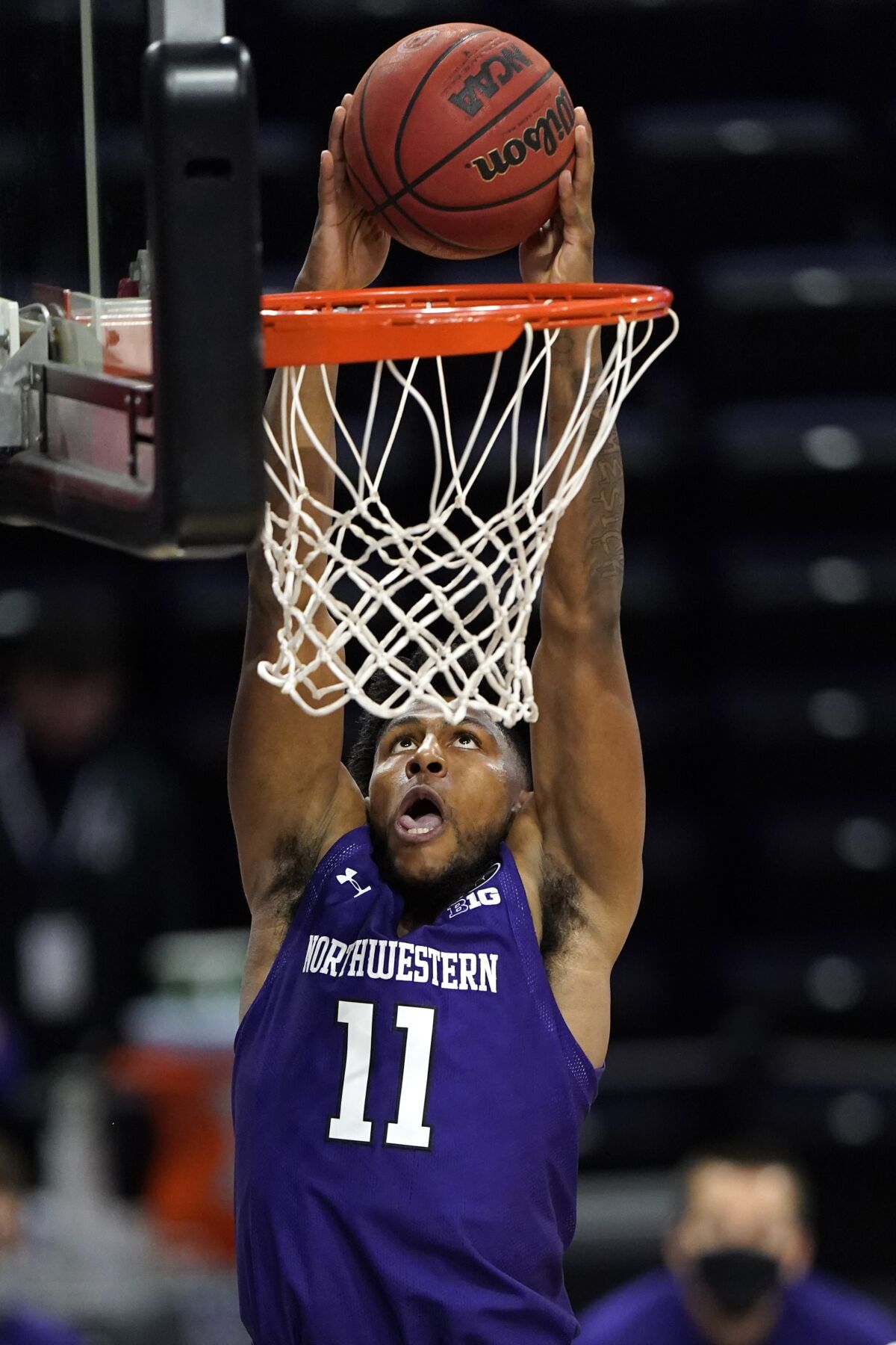 Northwestern guard Anthony Gaines dunks against Chicago State during the second half of an NCAA college basketball game in Evanston, Ill., Saturday, Dec. 5, 2020. (AP Photo/Nam Y. Huh)