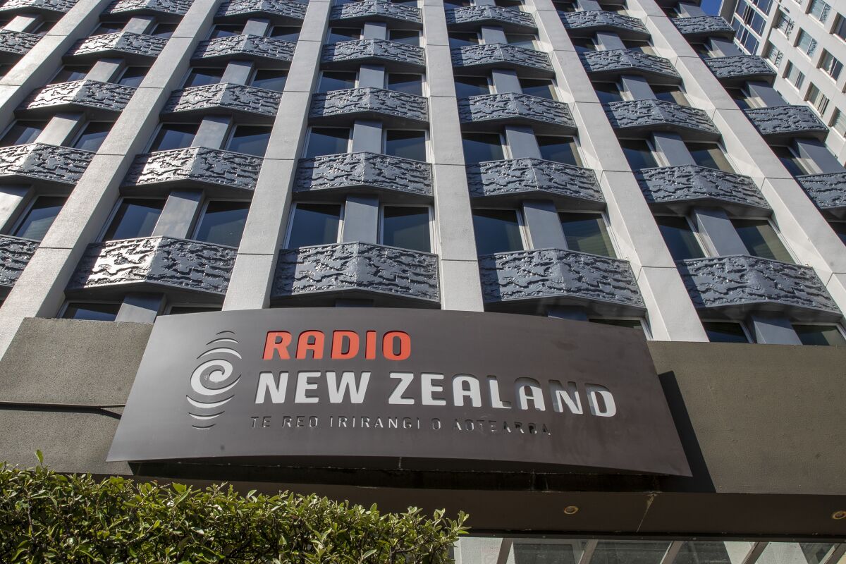 This photo shows the exterior of the Radio New Zealand building in Wellington, New Zealand, Thursday, March 10, 2022. The New Zealand government announced Thursday, it would merge its public television and radio broadcasters into a new organization. (Mark Mitchell/NZ Herald via AP)