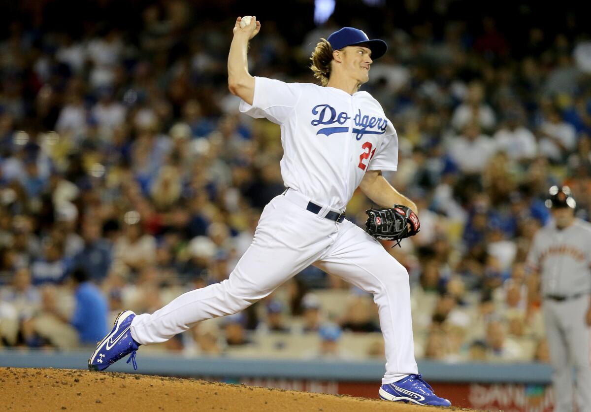 Dodgers starting pitcher Zack Greinke delivers a pitch during the second inning of a game against the Giants on Sept. 1.