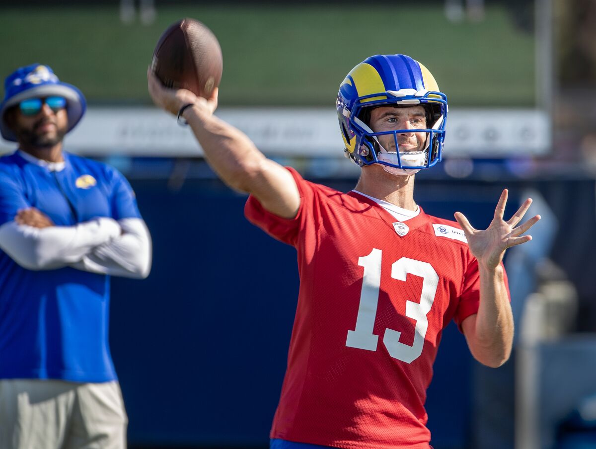 Rams quarterback Stetson Bennett readies to pass during Rams training camp.