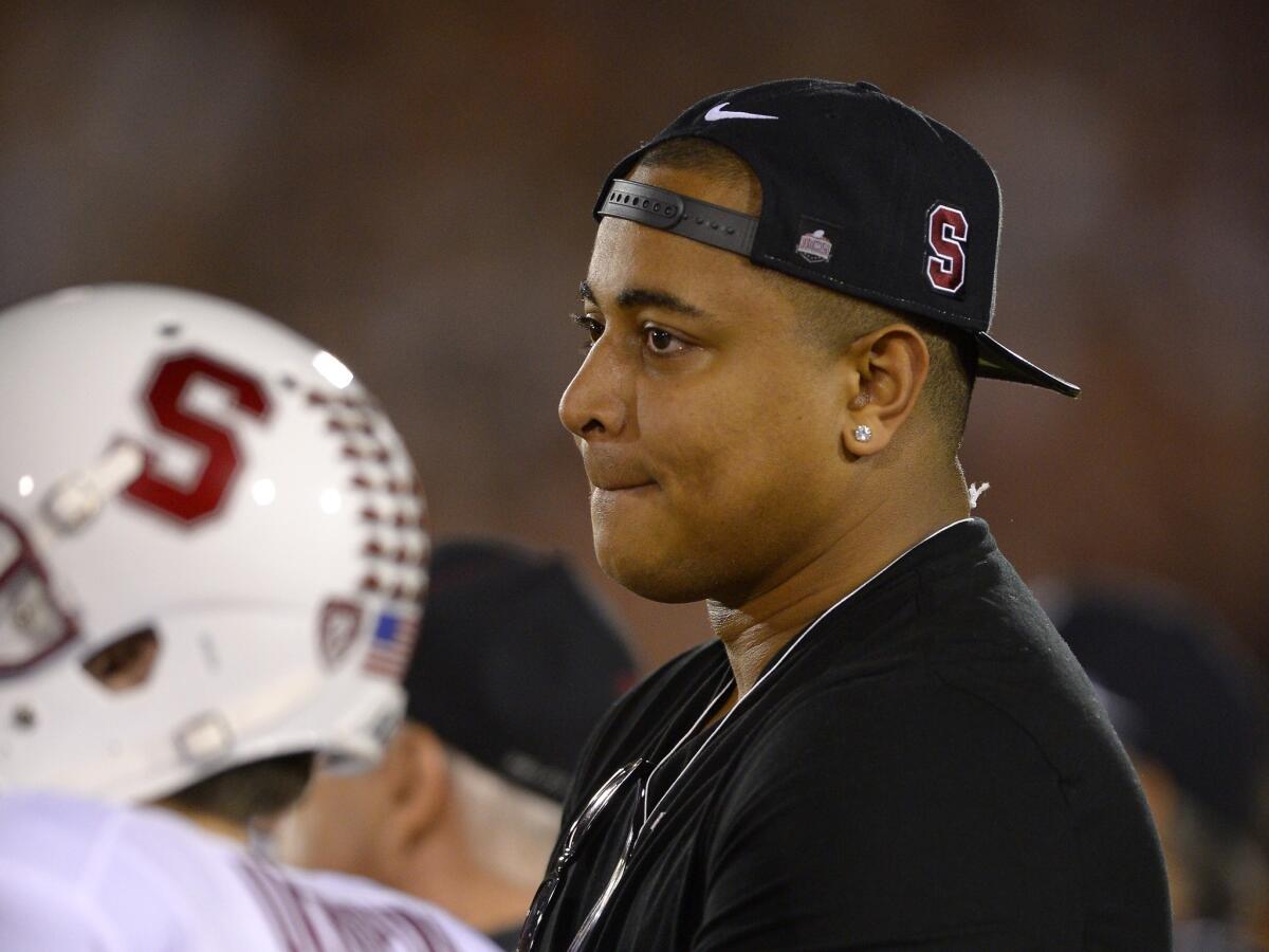 Former Miami Dolphins offensive lineman and Stanford alumnus Jonathan Martin watches the Cardinal play USC on Nov. 16. Martin reportedly has met again with an NFL investigator regarding the Dolphins' bullying scandal.