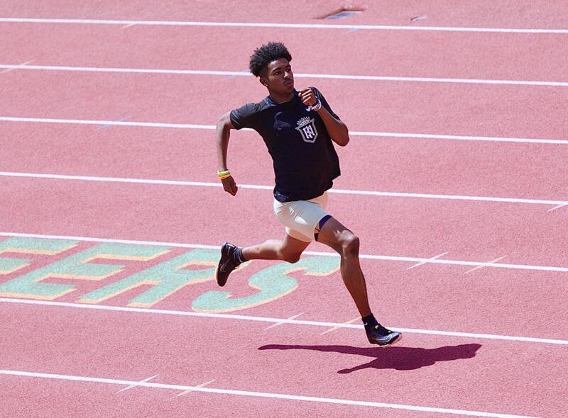 Servite freshman Jaelen Hunter separates from the pack on his way to winning the 400 meters.