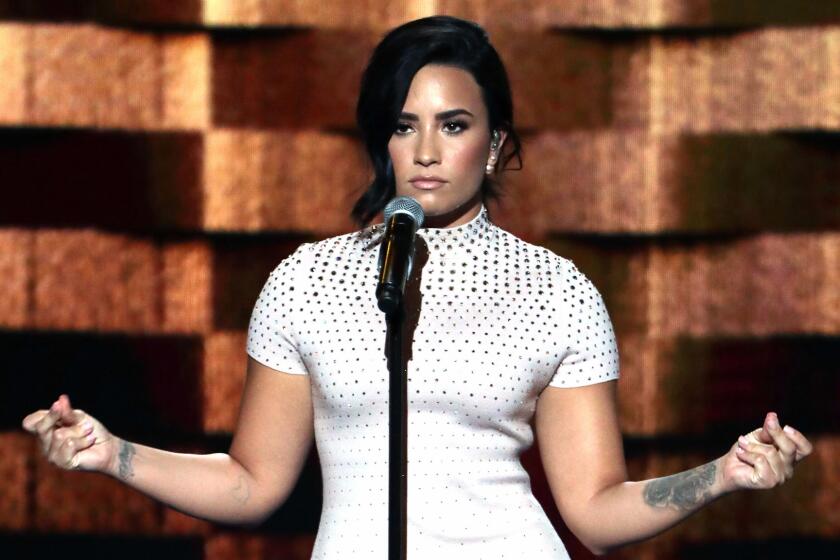Pop singer Demi Lovato performs on the first day of the Democratic National Convention in Philadelphia.