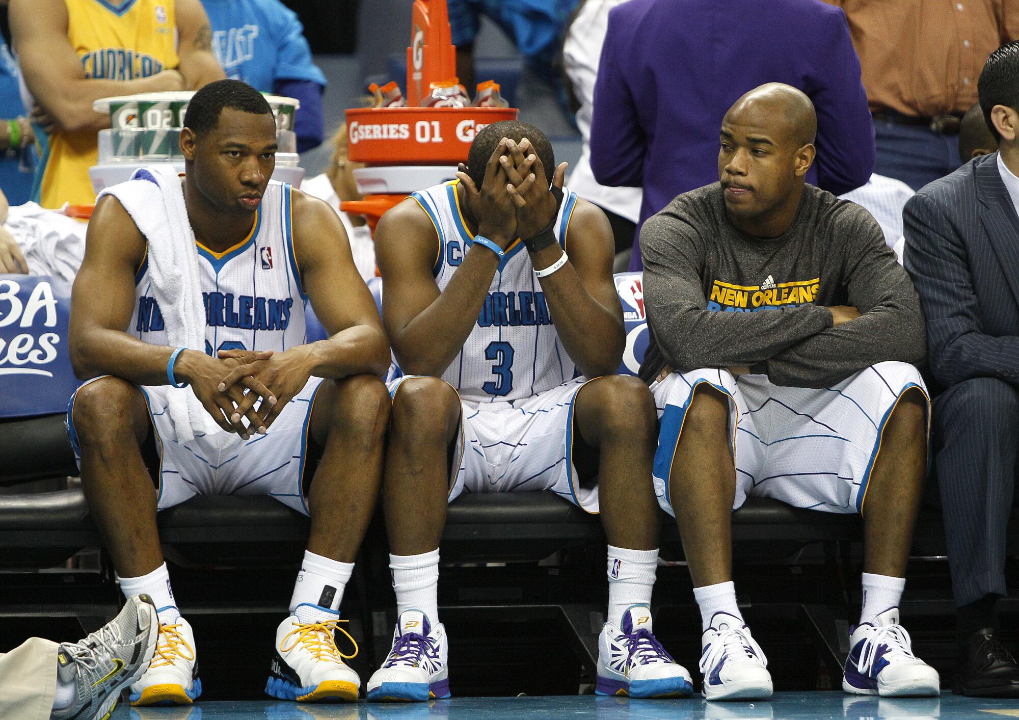 Hornets guards (from left) Willie Green, Chris Paul and Jarrett Jack react on the bench during a playoff loss to the Lakers.