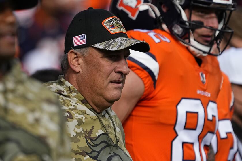 Denver Broncos head coach Vic Fangio watches prior to an NFL football game against the Philadelphia Eagles, Sunday, Nov. 14, 2021, in Denver. (AP Photo/Jack Dempsey)