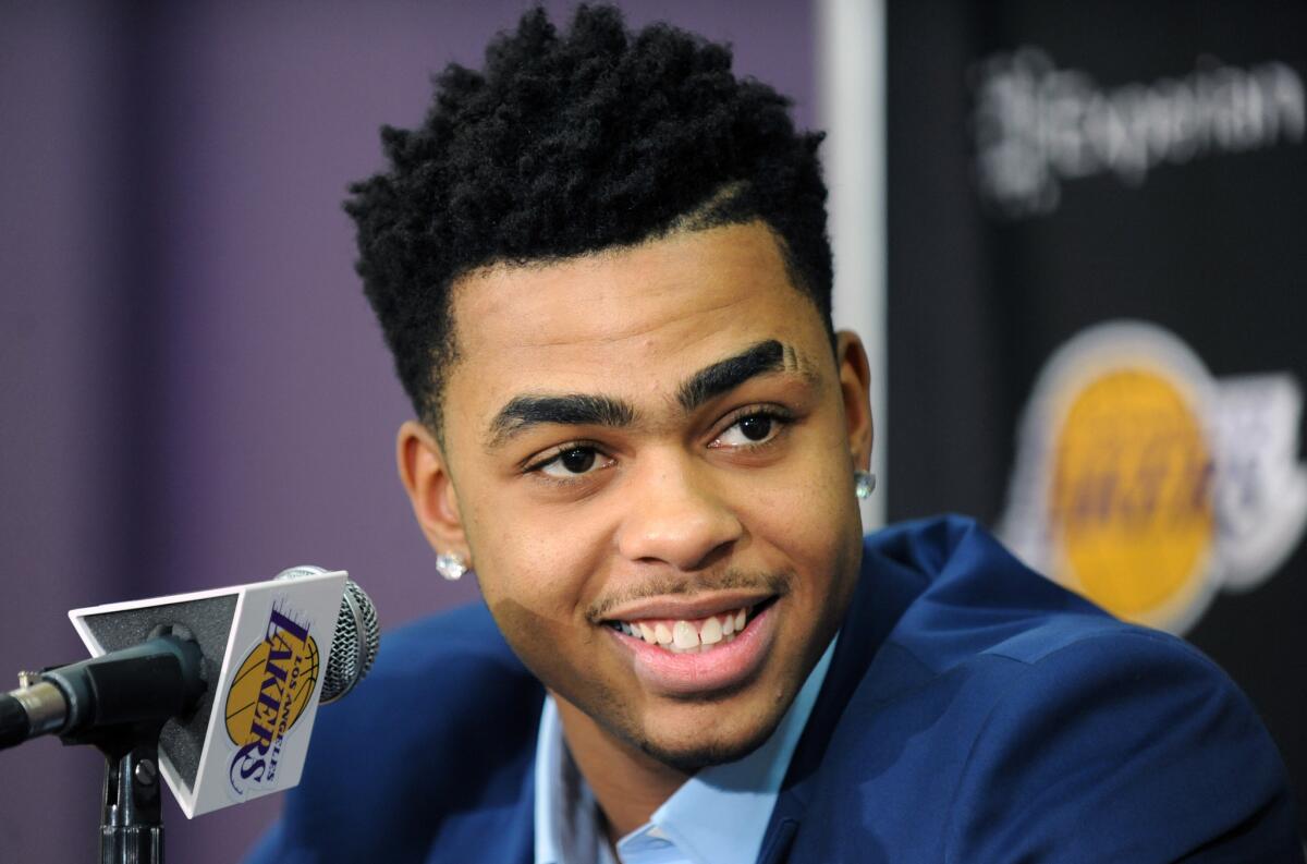 D'Angelo Russell listens to a question during a news conference introducing Russell and the other Lakers' draft picks.