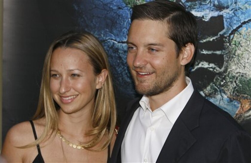 FILE - This Wednesday, Aug. 8, 2007 picture shows Actor Tobey Maguire, right, and Jennifer Meyer in Los Angeles. Meyer has given birth to the couple's second child, a boy on Friday, May 8, 2009 according to People.com. (AP Photo/Chris Polk, File)