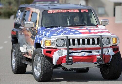Karla Comfort arrives in her specially painted Hummer at Camp Pendleton.
