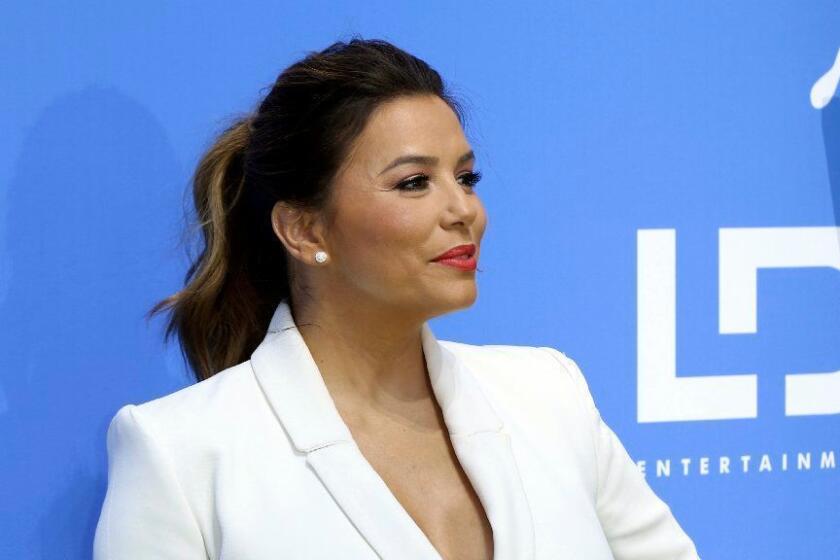 Eva Longoria arrives at the World Premiere of "Dog Days" at the Atrium at Westfield Century City on Sunday, Aug. 5, 2018, in Los Angeles. (Photo by Willy Sanjuan/Invision/AP)