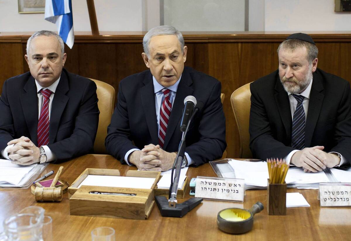 Israeli Prime Minister Benjamin Netanyahu, center, in Jerusalem, has denounced the preliminary international deal on Iran’s nuclear program. Some members of the U.S. Congress may be torn between a desire to back President Obama and long-standing support for Israel.