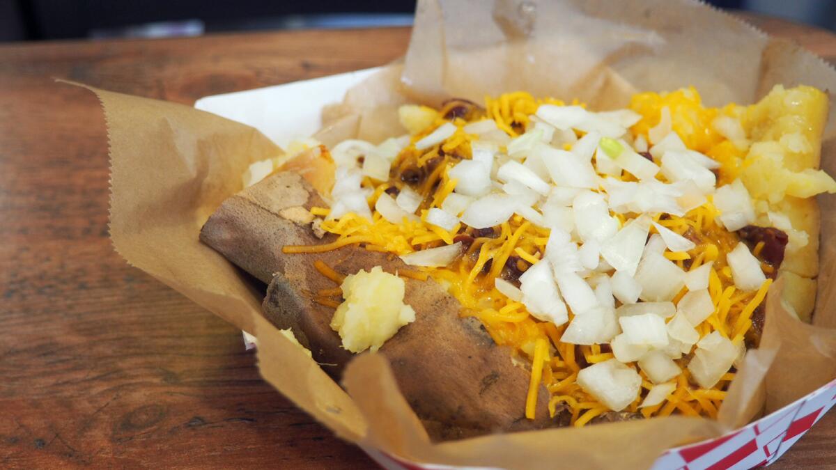 A yam "jacket potato" stuffed with chili, cheese and onions from Spudds in Pasadena.