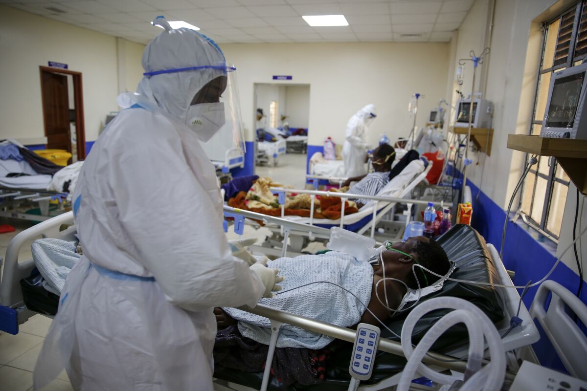 Medical workers attend to coronavirus patients in Kenya.