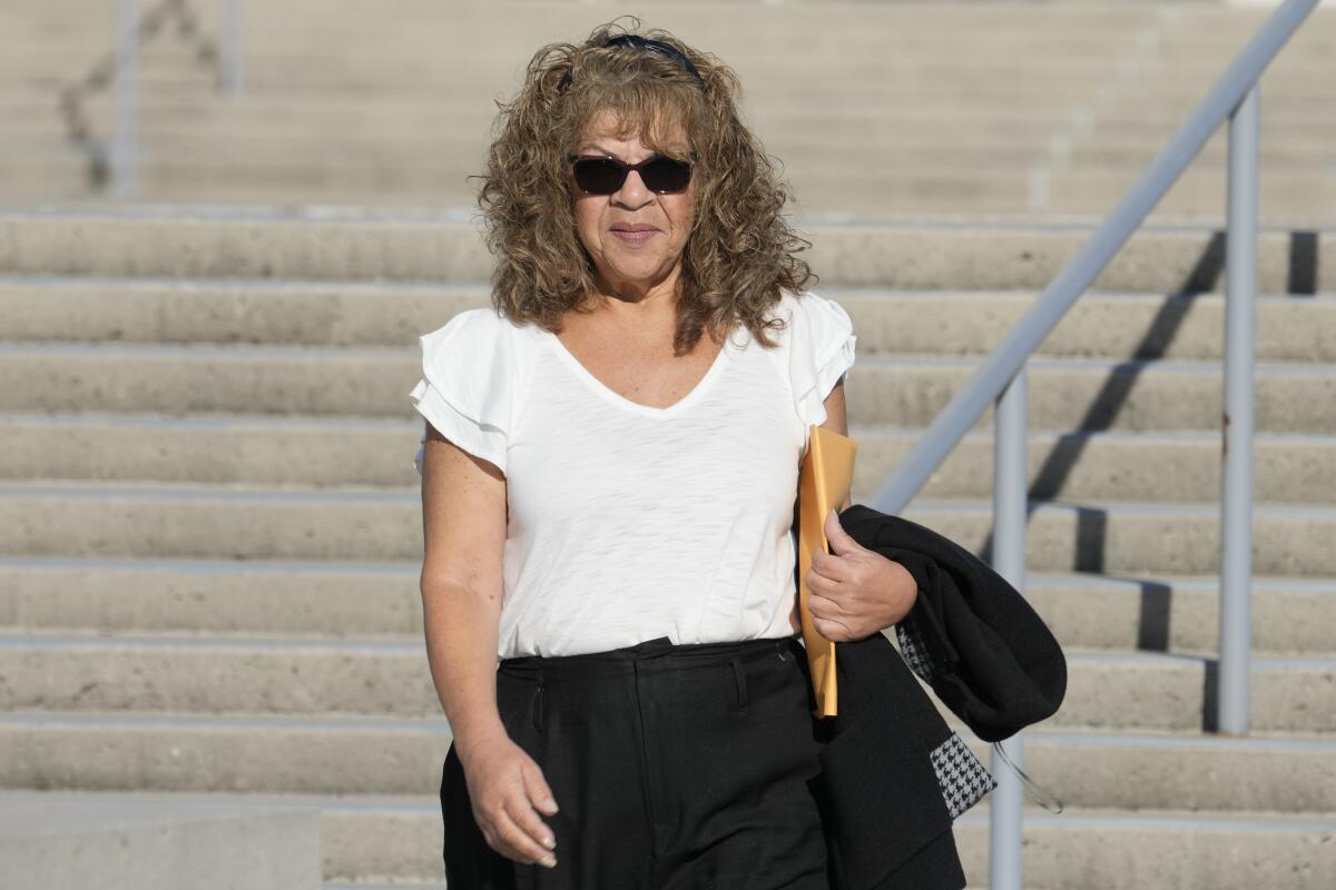 Nancy Marks leaves federal court.