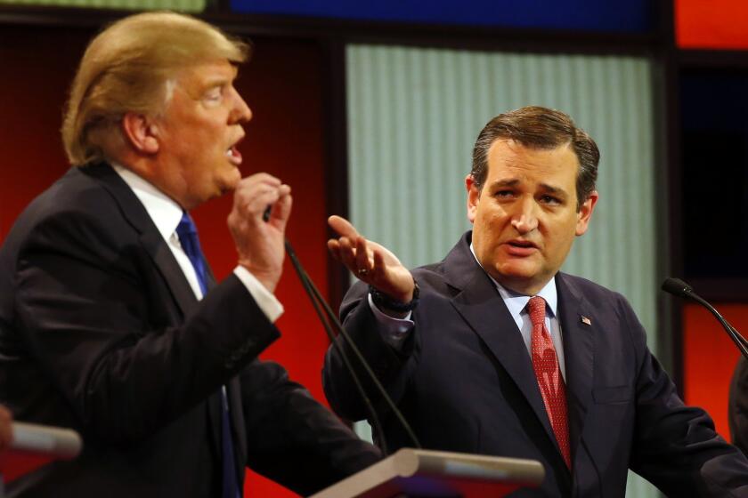 Republican presidential candidates, businessman Donald Trump and Sen. Ted Cruz, R-Texas, argue a point during a Republican presidential primary debate at Fox Theatre, Thursday, March 3, 2016, in Detroit. (AP Photo/Paul Sancya) ORG XMIT: MIKS238