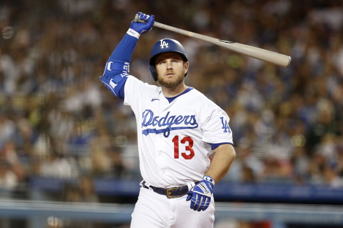 Dodgers third baseman Max Muncy reacts after striking out in sixth inning Friday.