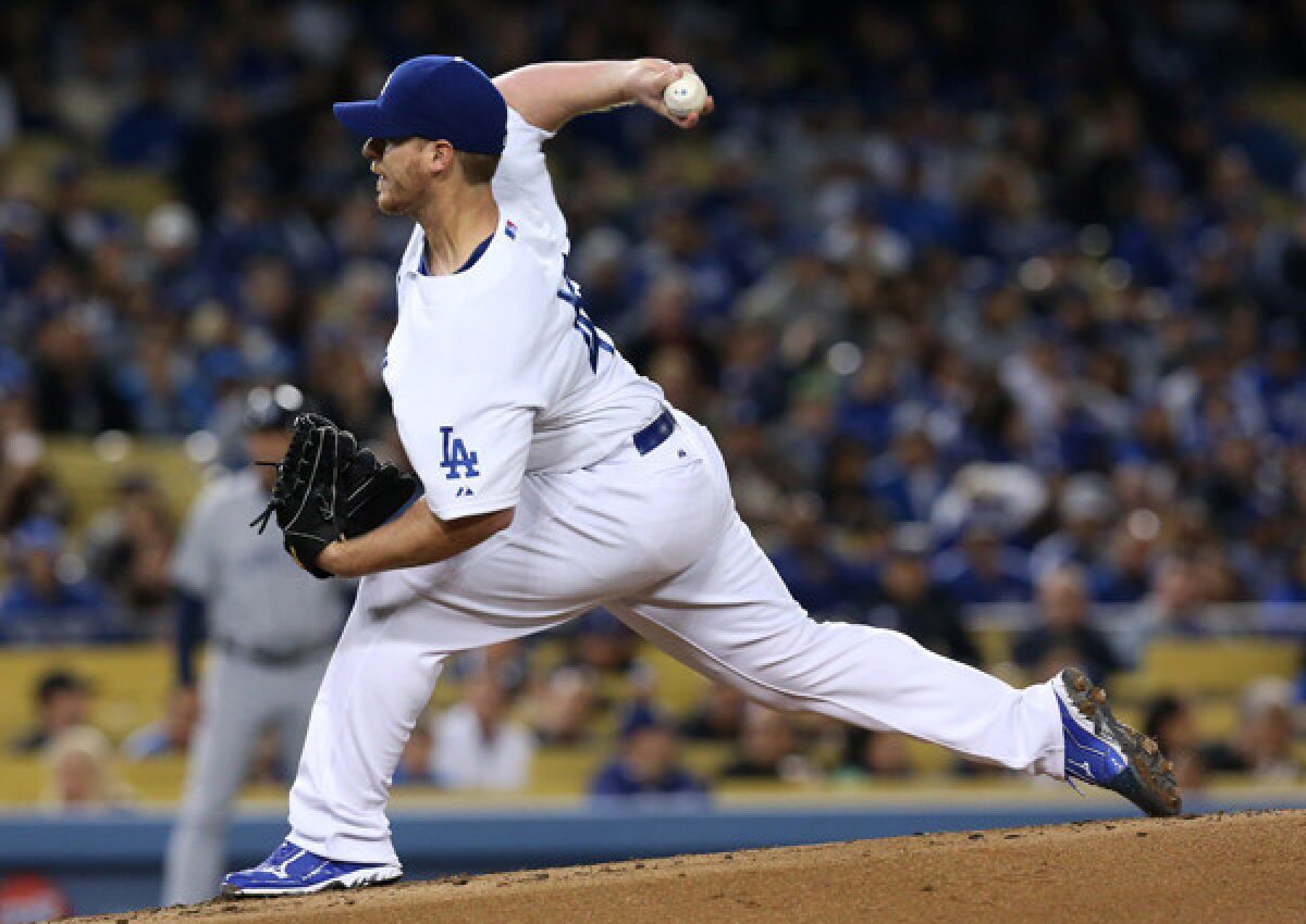 Dodgers starter Chad Billingsley delivers a pitch against the Padres on Monday at Dodger Stadium.