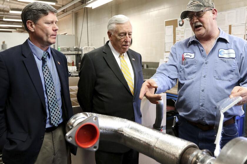 Jerry Olson, right, of Culimeta-Saveguard in Eau Claire, Wis., gives a tour to Rep. Ron Kind - D-Wis., left, and House Democratic Whip Steny Hoyer on Thursday, April 5, 2018. Hoyer headed to Trump country this week in a last-chance campaign for the top spot. Hoyer, a Maryland centrist, has spent most of his career in the shadow of liberal leader Nancy Pelosi. As Democrats consider who will replace Pelosi, Hoyerâs allies say he could be a bridge to the next generation. Others find the notion that little known, 78-year-old politician could emerge as the face of his party far-fetched. (Dan Reiland/The Eau Claire Leader-Telegram via AP)