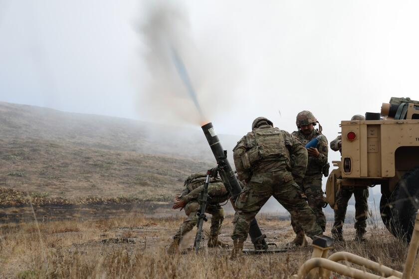 Soldiers from the California National Guard's 1st Batallion, 143rd Field Artillery fired an M119 howitzer on San Clemente Island during military exercises in late July on San Clemente Island.