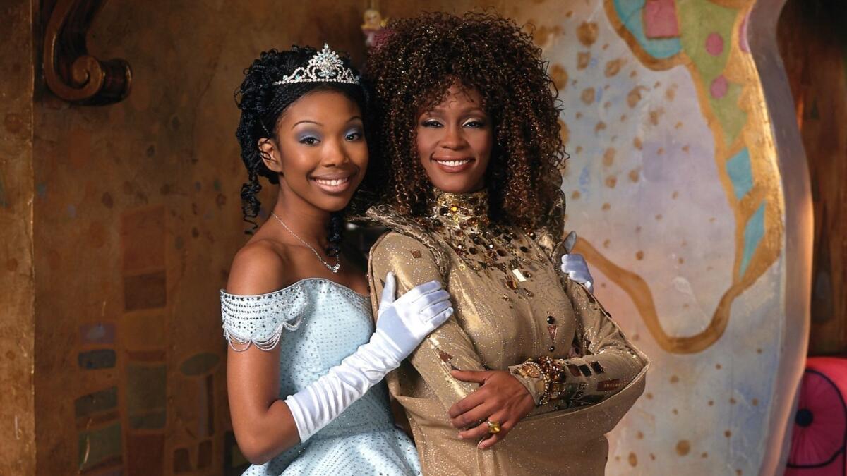 Brandy, left, and the late Whitney Houston as Cinderella and her Fairy Godmother