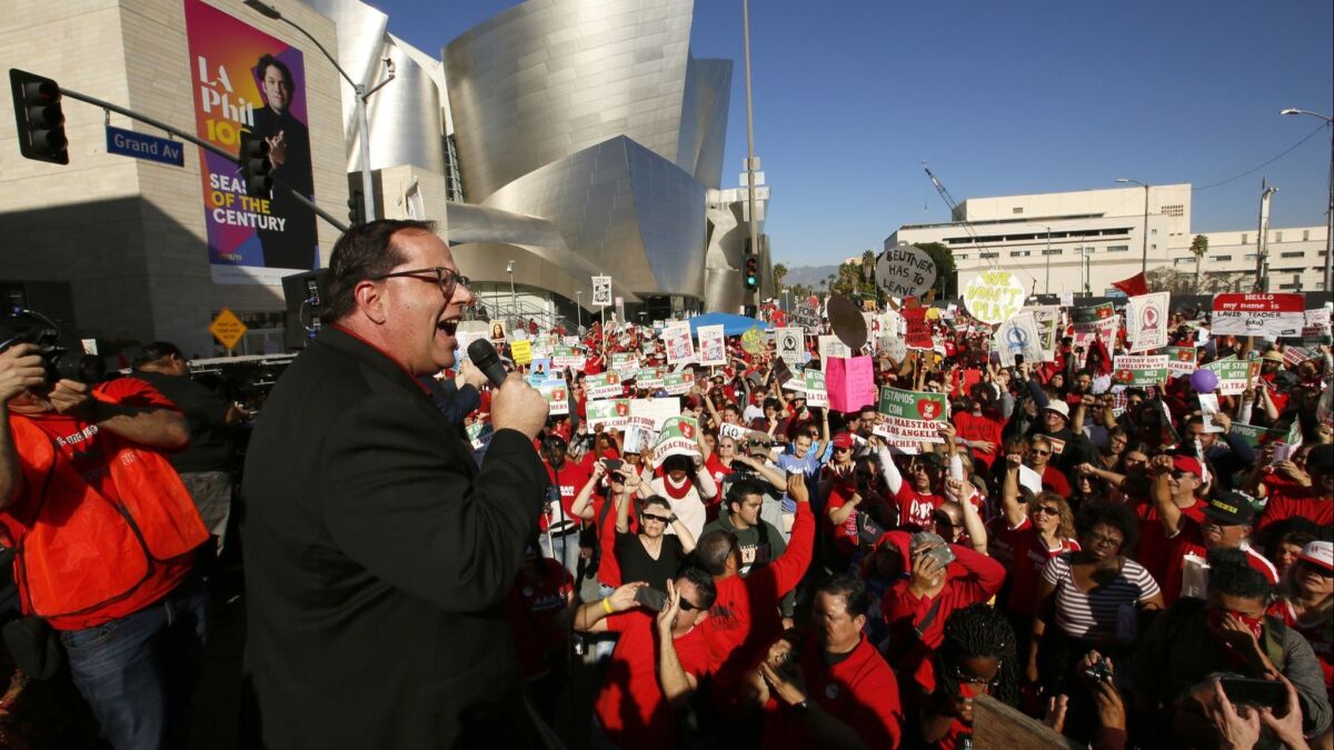 United Teachers Los Angeles president Alex Caputo-Pearl addresses thousands of teachers union members and supporters at a downtown rally in December. It appears as though negotiators may meet again.