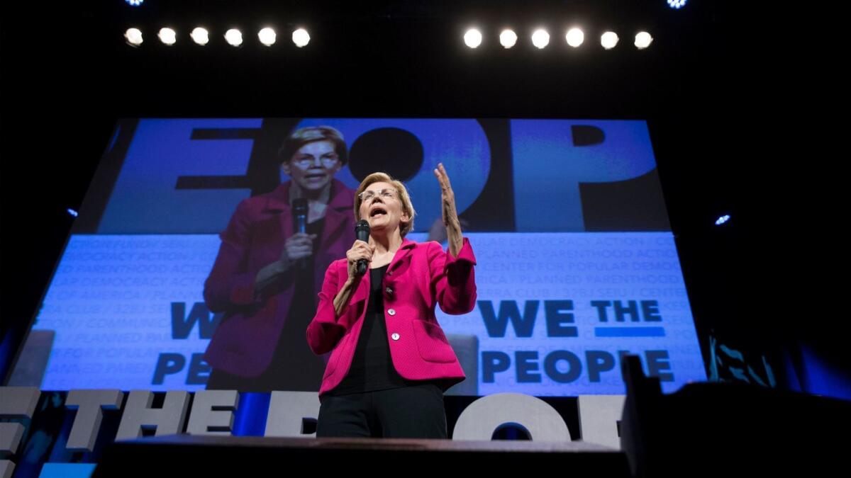 Sen. Elizabeth Warren (D-Mass.) speaks April 1 at a town hall in Washington, sponsored by two major unions and several progressive groups.
