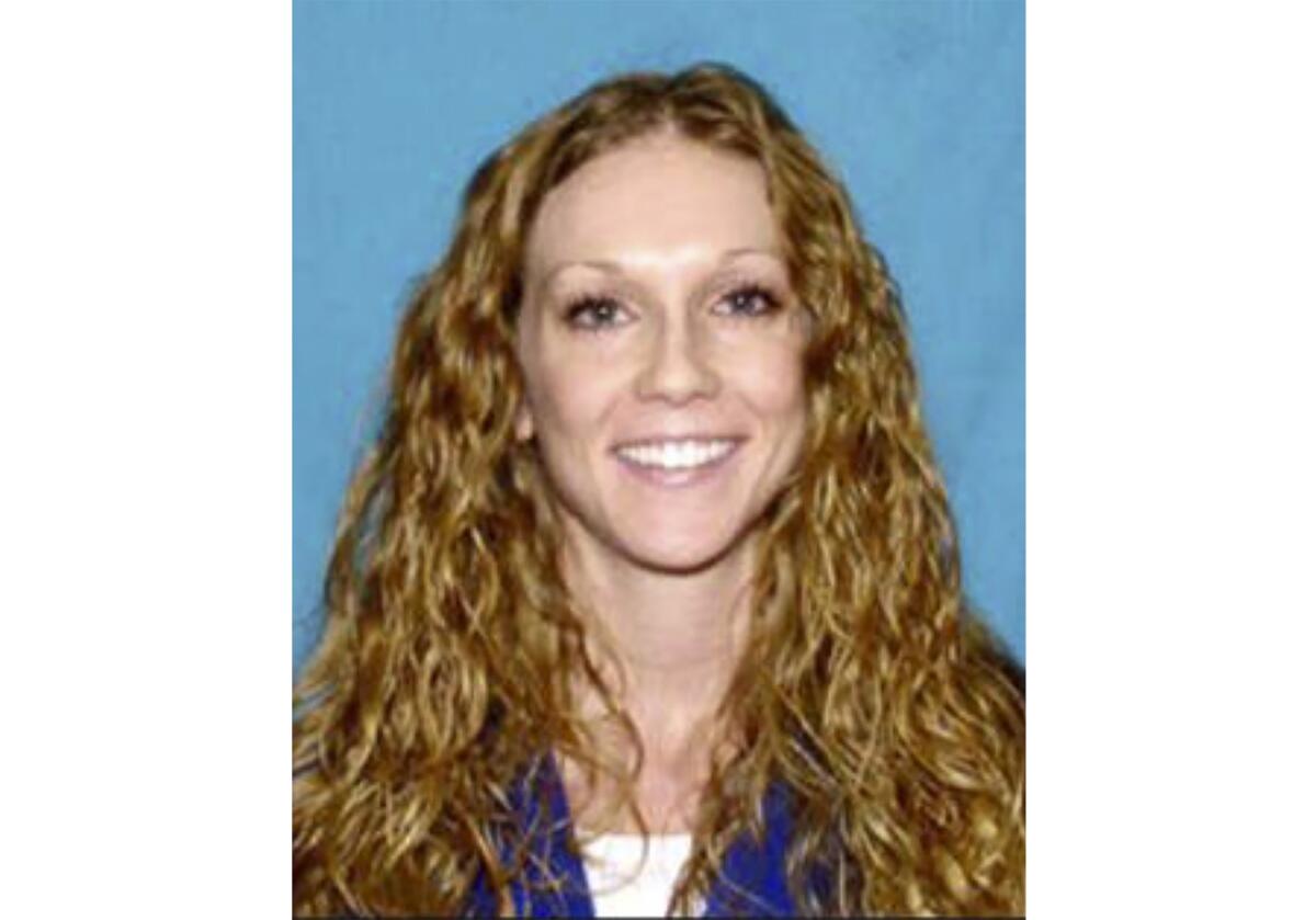 FILE - This undated photo provided by the U.S. Marshals Service shows Kaitlin Marie Armstrong. A Texas judge on Wednesday, Nov. 9, 2022, refused to throw out statements made to police by Armstrong, who is accused of killing professional cyclist Moriah “Mo” Wilson, and set the case for trial in June 2023. (U.S. Marshals Service via AP, File)