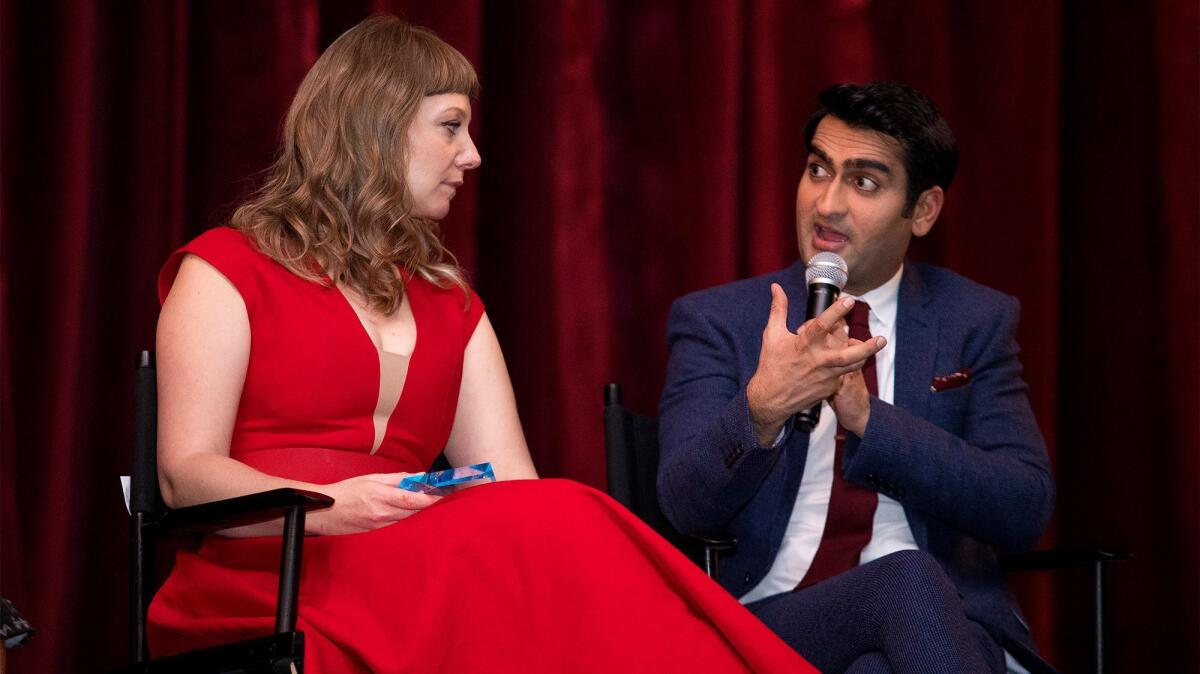 Emily V. Gordon and Kumail Nanjiani talk during a Q&A following an Orange County Film Society screening of their movie “The Big Sick” at the Regency Lido Theater on Dec. 7.