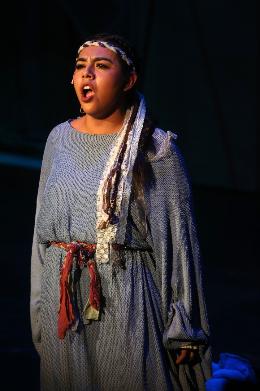 Estefani Lopez performs during a final dress rehearsal of “Amahi and the Night Visitors,” at LA County High School for the Arts 