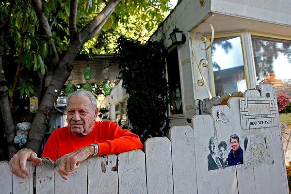 Vernon Van Wie, 90, stands outside the mobile home where he has lived for the last 17 years in Village Trailer Park in Santa Monica. The property owner wants to redevelop the nearly 4-acre site with residential units, offices and shops. But tenants have urged the city to consider buying the property, valued at as much as $30 million. See full story