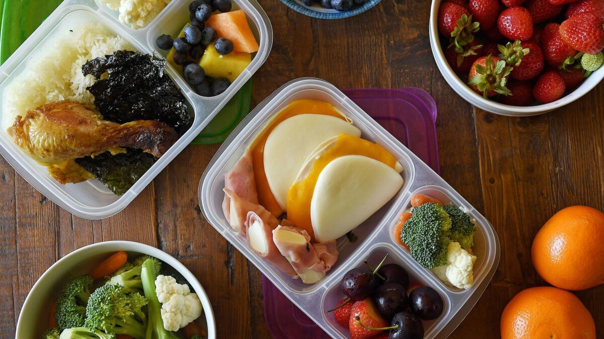 Chef Jet Tila packs his kids' lunchbox with Thai BBQ chicken, sticky rice, roasted seaweed, fruit, veggies, turkey and cheese baos, string cheese and ham roll-ups, and organic greek yogurt with ranch dip.