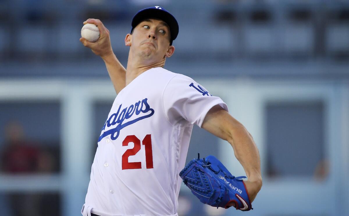 Dodgers starting pitcher Walker Buehler throws against the Arizona Diamondbacks on July 3.