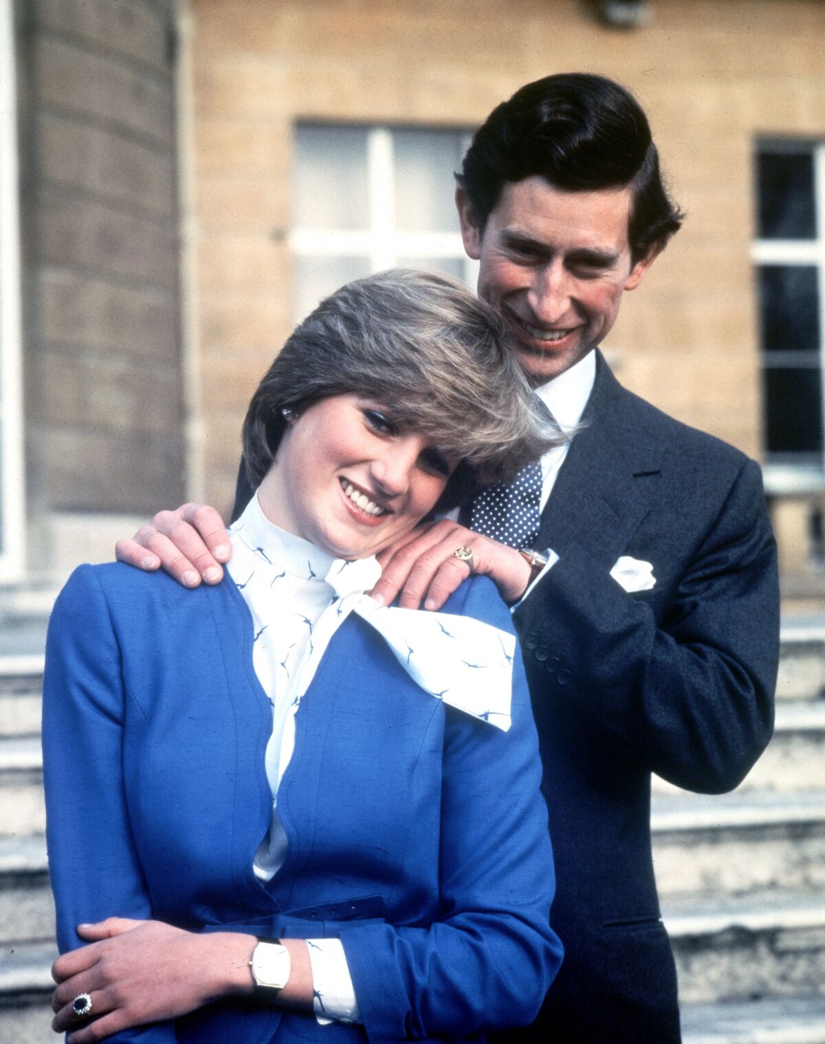  February 1981: Britain's Prince Charles and Lady Diana Spencer before the wedding. She wears a conservative blue jacket.