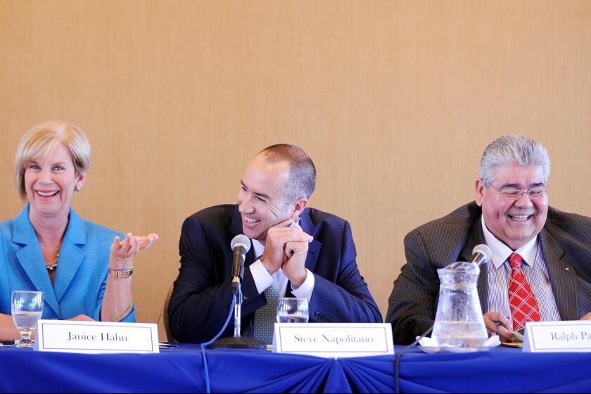 Janice Hahn with her two opponents in the county supervisor race -- Steve Napolitano, center, and Ralph Pacheco -- during a debate in Torrance.