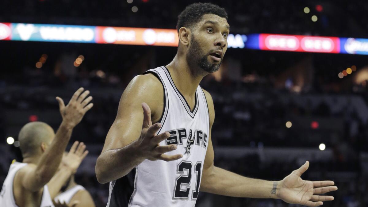 San Antonio Spurs forward Tim Duncan questions why he was called for a foul during the first half of Game 4 of the Western Conference quarterfinals on April 26, 2015.