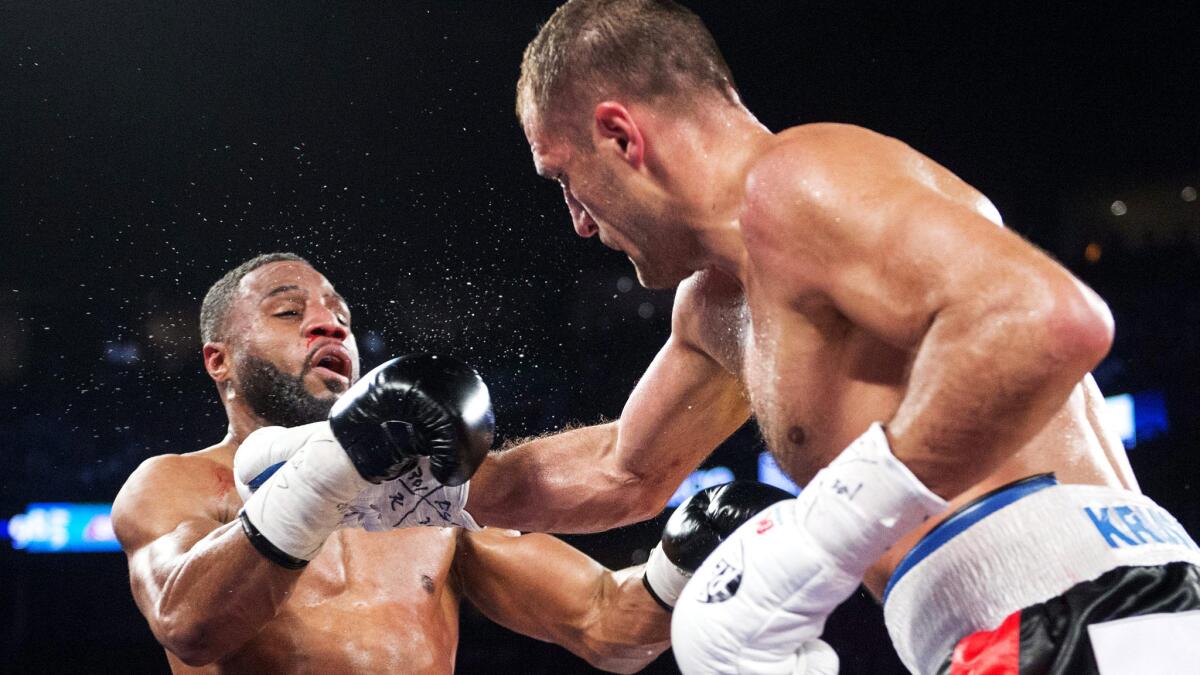 Sergey Kovalev connects against Jean Pascal during their light-heavyweight fight on Jan. 30 in Montreal.