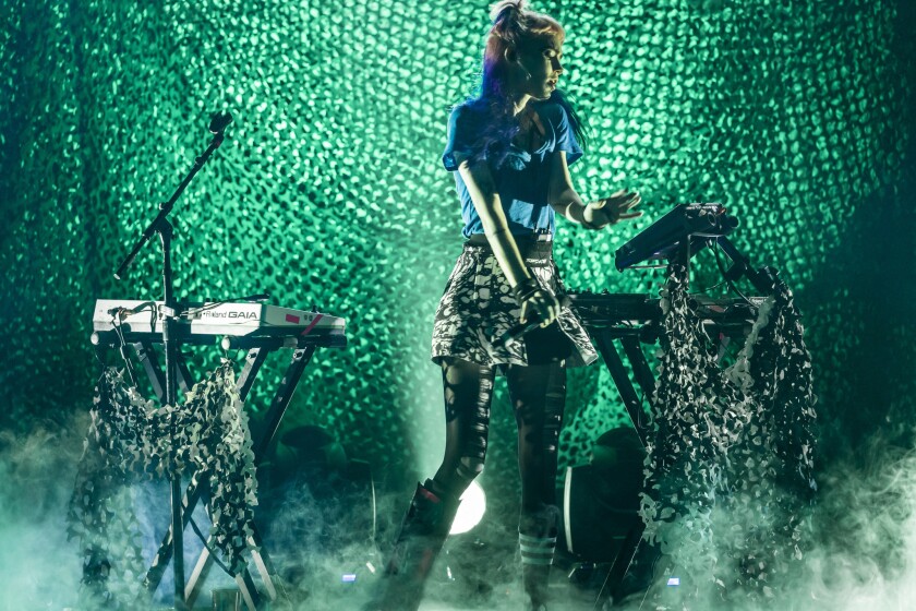 Review Ahead of 'Art Angels,' Grimes flirts with pop at