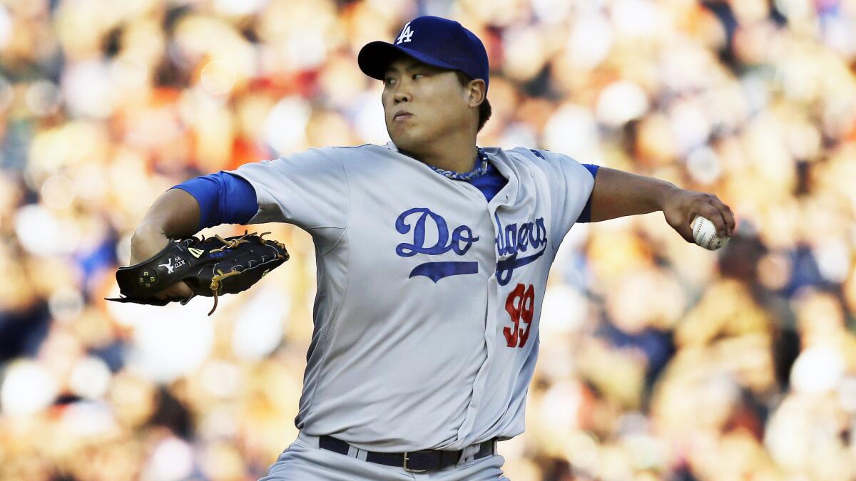Dodgers starter Hyun-Jin Ryu delivers a pitch during the first inning of the team's 14-5 road loss to the Detroit Tigers on Tuesday.