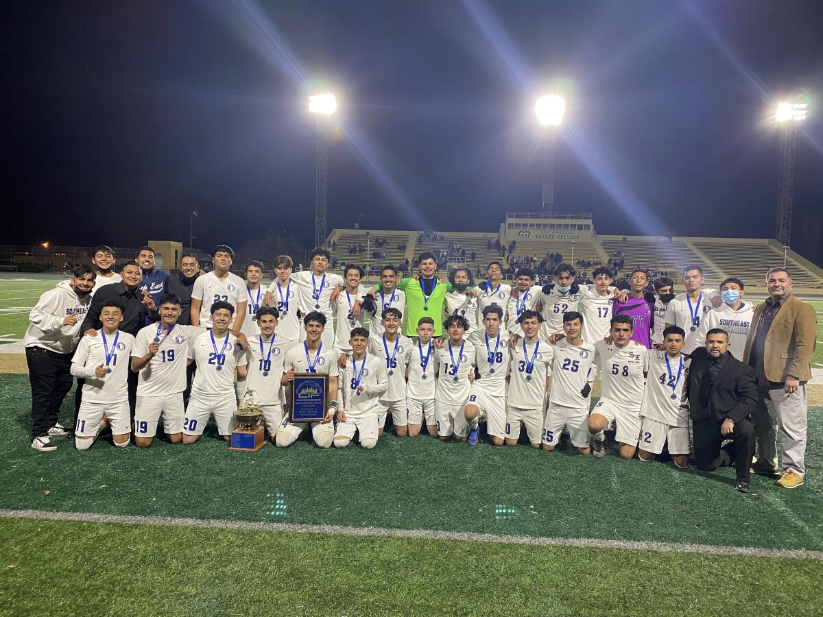 South East celebrates City Section Division I soccer title with 2-1 win over Birmingham in overtime.