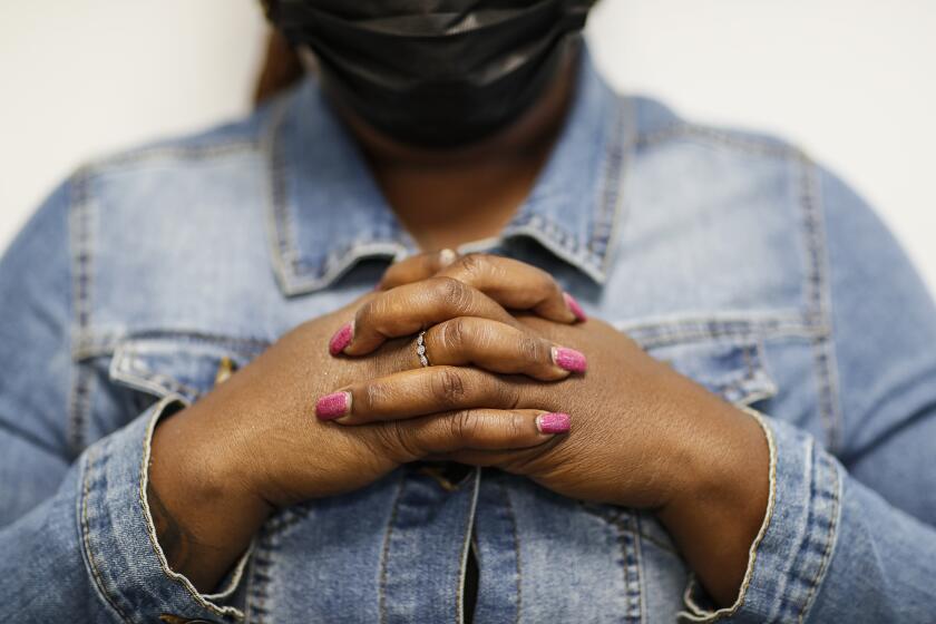 Los Angeles, CA, Monday, May 16, 2022 - Un unidentified person who alleges she was sexually assaulted as children at the former MacLaren Children's Center in Pasadena. The person is photographed at their attorney's office. (Robert Gauthier/Los Angeles Times)